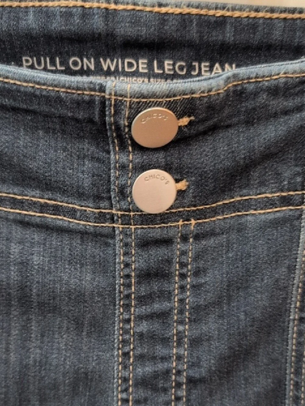 Chico's Dark Denim Wide-Leg Jeans with Contrast Stitching.
